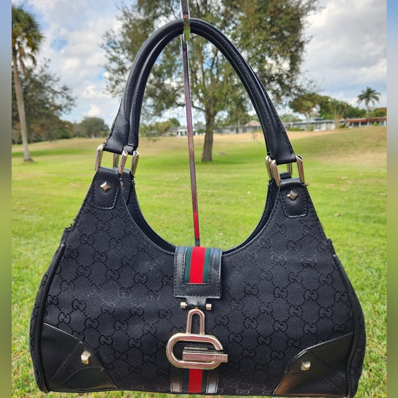 Gucci Handbags - Vintage Gucci black canvas and blk leather small hobo